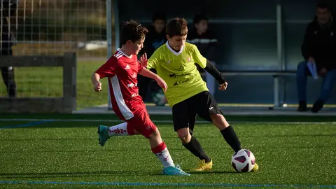 Irabia Izaga se enfrenta a Vedruna durante el torneo interescolar 2022. PABLO LASAOSA