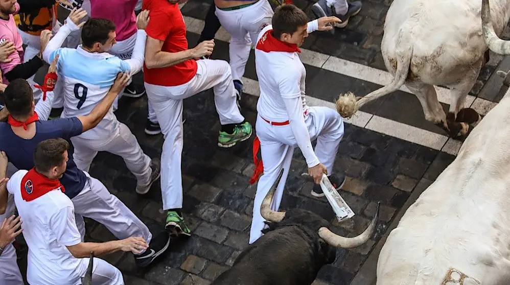 Cuarto encierro con toros de la ganadería Jandilla en Estafeta.Maite H.Mateo-6