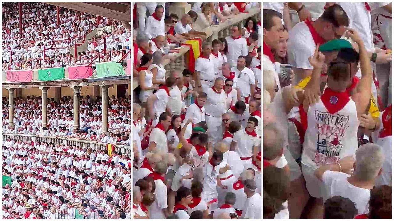 Proetarras intentan arrancar una bandera de Espa&ntilde;a en la plaza de toros de Pamplona.